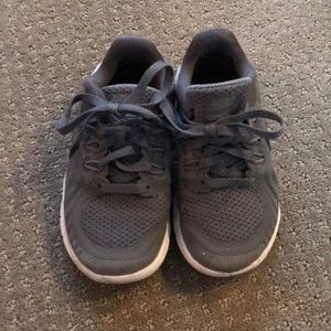 Grey Nike tennis shoes